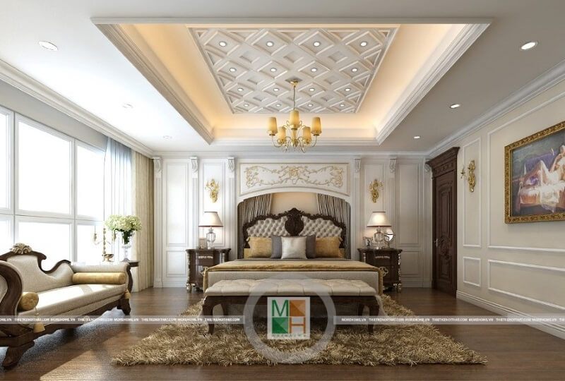 Ghế bọc da tân cổ điển có kiểu dáng dài và đường nét chạm khắc tinh tế với nét nghệ thuật được đặt ở đuôi giường đẹp.